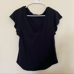 We The Free black v neck shirt with flowy sleeves